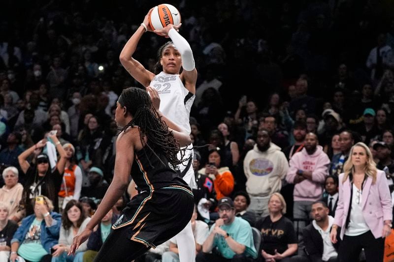 Las Vegas Aces' A'ja Wilson shoots over New York Liberty's Jonquel Jones during the second half of a WNBA basketball semifinal game, Tuesday, Oct. 1, 2024, in New York. The Liberty won 88-84. (AP Photo/Frank Franklin II)