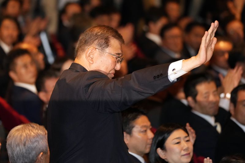 Shigeru Ishiba acknowledges after he was elected as new head of Japan's ruling party at the Liberal Democratic Party's (LDP) leadership election Friday, Sept. 27, 2024, at the party headquarters in Tokyo. (AP Photo/Hiro Komae, Pool)