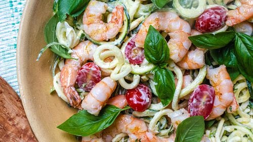 Spiralized zucchini noodles tossed in ranch dressing with grilled shrimp, tomatoes and basil. 
(Virginia Willis for The Atlanta Journal-Constitution)
