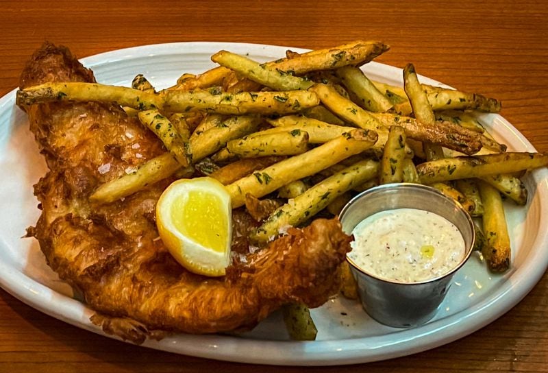 The Porter has retained several menu items and recipes from its previous iteration, including fish and chips. (Henri Hollis/henri.hollis@ajc.com)