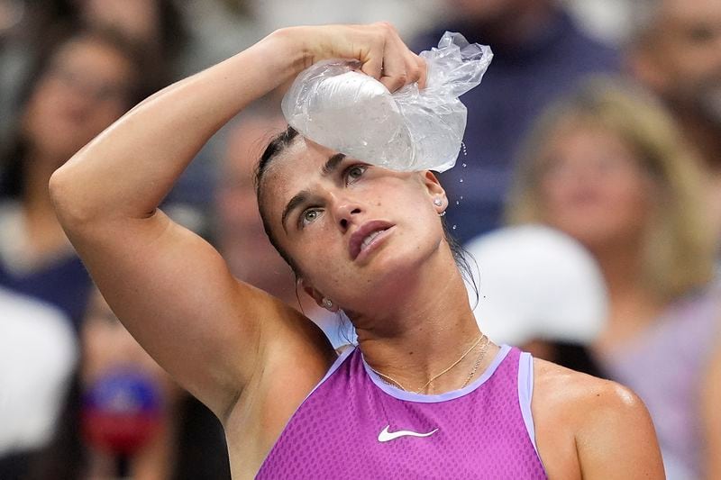 Aryna Sabalenka, of Belarus, cools off with an ice pack between games against Jessica Pegula, of the United States, during the women's singles final of the U.S. Open tennis championships, Saturday, Sept. 7, 2024, in New York. (AP Photo/Julia Nikhinson)