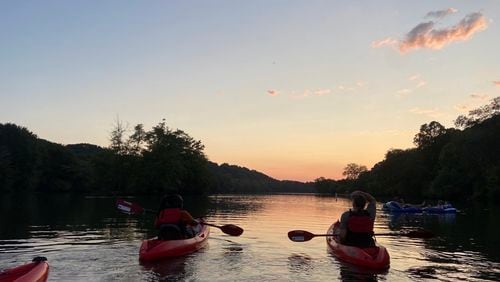 The Nantahala Outdoor Center provides guided kayaking and ducky tours on the Chattahoochee River at sunset. 
(Courtesy of the Nantahala Outdoor Center)