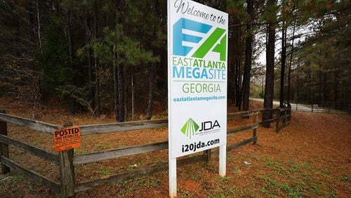 A welcome sign sits at an entrance to the East Atlanta Megasite on US 278 near I-20 on Wednesday, Dec 8, 2021, near the tiny rural community of Rutledge, where Rivian will build an electric vehicle plant.   “Curtis Compton / Curtis.Compton@ajc.com”`