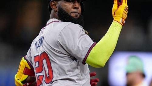 Atlanta Braves' Marcell Ozuna celebrates after hitting a home run during the ninth inning of a baseball game against the San Diego Padres, Friday, July 12, 2024, in San Diego. (AP Photo/Gregory Bull)