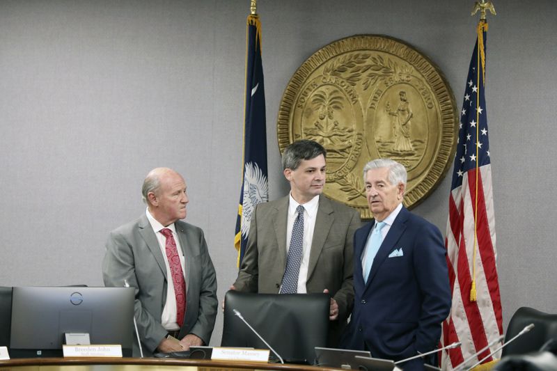 South Carolina Senate President Thomas Alexander, R-Walhalla, left; Senate Majority Leader Shane Massey, R-Edgefield, center; and Sen. Nikki Setlzer, D- West Columbia, right, speak before a South Carolina Senate committee planning to write a comprehensive energy bill in 2025 in Columbia, S.C., on Thursday, Aug. 22 2024. (AP Photo/Jeffrey Collins)