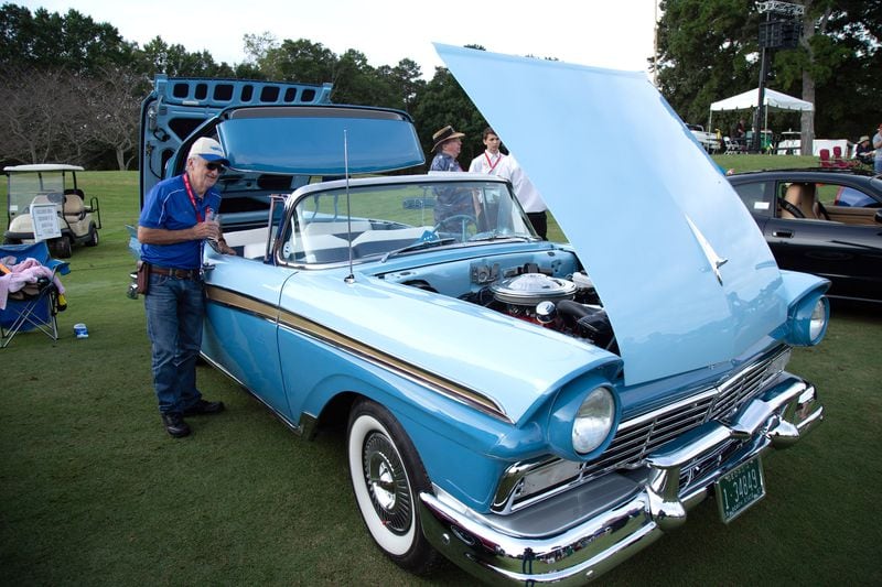Owner Bill Hearnburg makes sure everything is in place with his 1957 Ford Skyliner during the third-annual Atlanta Concours d'Elegance held at Chateau Elan in Braselton GA Saturday, September 29, 2018. STEVE SCHAEFER / SPECIAL TO THE AJC