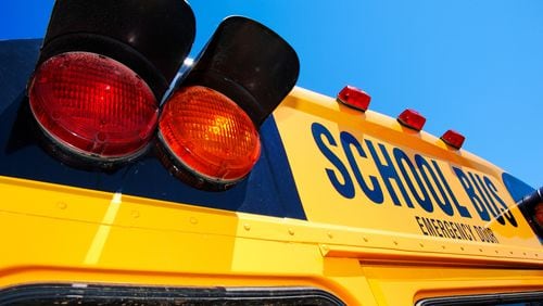 A Forsyth County school bus driver faces a DUI charge after she allegedly hit another car with dozens of students aboard her bus, officials said.