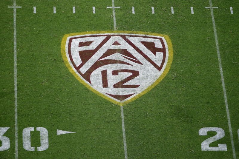 FILE - The Pac-12 logo at Sun Devil Stadium during the second half of an NCAA college football game between Arizona State and Kent State in Tempe, Ariz., Aug. 29, 2019. (AP Photo/Ralph Freso, File)