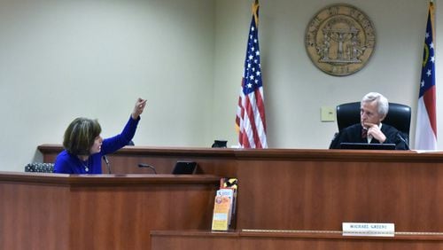 Wendy Gunn (left) appeals to Chief Judge Michael Greene at Gwinnett County Recorder’s Court on Tuesday, June 20, 2018. With so many school districts now using school bus cameras, we look at the process of how the alleged perpetrator is identified and what legal recourse does one have it you want to fight the citation. HYOSUB SHIN / HSHIN@AJC.COM