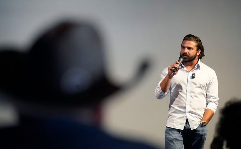 Brandon Herrera, a gun-rights YouTube creator who calls himself "The AK Guy", speaks during a campaign stop, Thursday, May 23, 2024, in San Antonio. Herrera is facing prominent Republican incumbent U.S. Rep. Tony Gonzales in a runoff election. (AP Photo/Eric Gay)