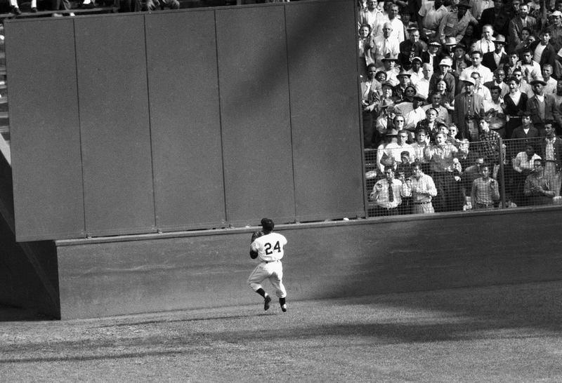 FILE - New York Giants' Willie Mays makes a catch of a ball hit by Cleveland Indians' Vic Wertz in Game 1 of the 1954 baseball World Series in New York's Polo Grounds on Sept. 29, 1954. (AP Photo, File)