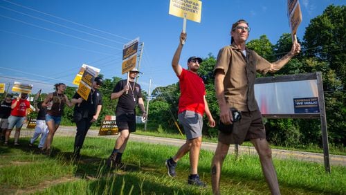 Teamster members of UPS participate in a practice picketing in Griffin on Saturday, July 8, 2023. They are preparing to go on strike August 1st if a contract agreement isn’t reached for facilities around the country. (Katelyn Myrick/katelyn.myrick@ajc.com)
