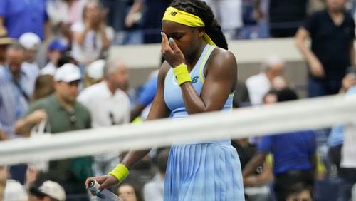 Coco Gauff, of the United States, reacts after losing to Emma Navarro, of the United States, during the fourth round of the U.S. Open tennis championships, Sunday, Sept. 1, in New York. 2024. (AP Photo/Pamela Smith)