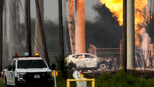 FILE - A massive pipeline fire burns after a vehicle drove through a fence along a parking lot and struck an above-ground valve near Spencer Highway and Summerton on Monday, Sept. 16, 2024, in La Porte, Texas. (Brett Coomer/Houston Chronicle via AP)