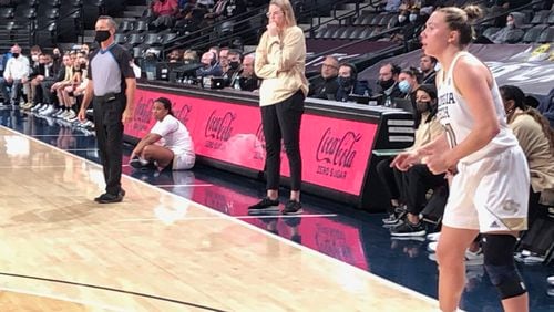 Georgia Tech assistant coach Blanche Alverson observes her team in the fourth quarter of the Yellow Jackets' 62-45 win over Wake Forest Dec. 19, 2021 at McCamish Pavilion. Alverson led the team in place of Nell Fortner, who was absent due to what the school termed health and safety protocol. (AJC photo by Ken Sugiura)