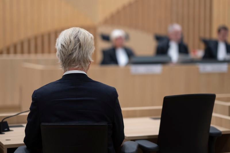 Anti-Islam lawmaker Geert Wilders, takes his seat at the high security court at Schiphol, near Amsterdam, Netherlands, Monday, Sept. 2, 2024, where two Pakistani men go on trial, likely in their absence, on charges of threatening anti-Islam lawmaker Wilders, whose Party for Freedom won national elections last year. (AP Photo/Peter Dejong)