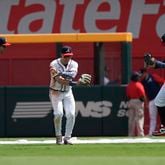 Atlanta Braves outfielders from left; Eli White, Jarred Kelenic and Adam Duvall celebrate after defeating the Philadelphia Phillies in a baseball game Sunday, July 7, 2024, in Atlanta. All three hit home runs. (AP Photo/John Bazemore)