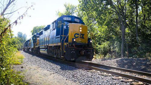 A man was struck by a freight train and killed Saturday morning following a fight in northwest Atlanta, according to police.