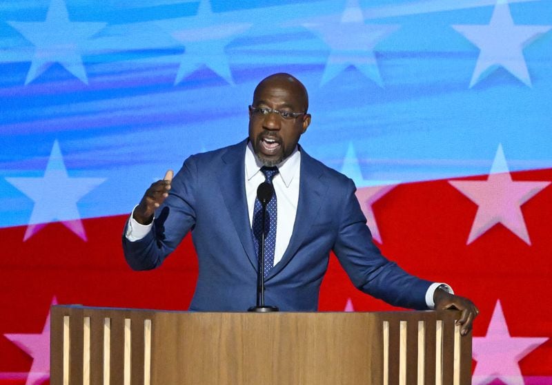 U.S. Sen. Raphael Warnock of Georgia speaks to delegates on the opening day of the Democratic National Convention in Chicago.