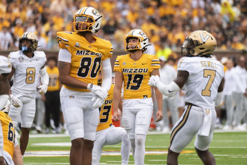 Missouri place kicker Blake Craig (19) watches his field goal attempt hit the goalpost during the first half of an NCAA college football game against Vanderbilt, Saturday, Sept. 21, 2024, in Columbia, Mo. (AP Photo/L.G. Patterson)