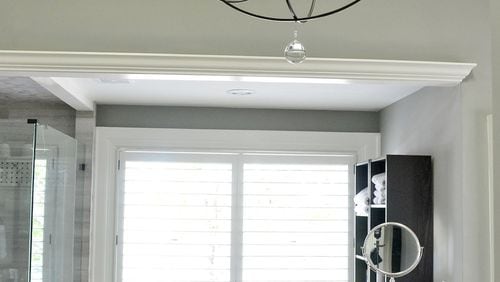 The master bathroom is located where the original outhouse stood. Now it’s an opulent bathing space with skylights and an oversized shower. Text by Lori Johnston and Shannon Adams/Fast Copy News Service. (Christopher Oquendo Photography/www.ophotography.com)