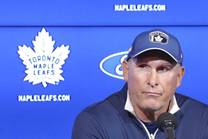 Toronto Maple Leafs new head coach Craig Berube speaks to the media during a press conference at the start of the NHL hockey team's training camp in Toronto, Wednesday, Sept. 18, 2024. (Nathan Denette/The Canadian Press via AP)