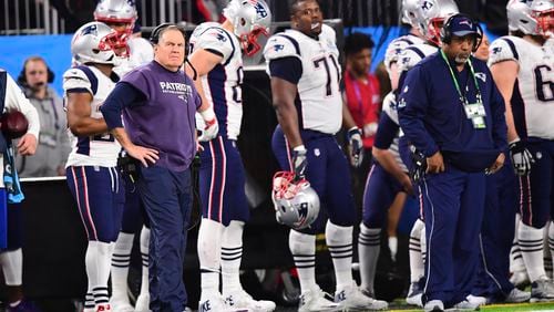 
                        FILE — New England Patriots head coach Bill Belichick, who had little time for the long sleeves on his sweatshirts and usually cut them off, on the sidelines of the Patriots’ Super Bowl loss to the Eagles at U.S. Bank Stadium in Minneapolis, on Feb. 4, 2018. The head coach of the Patriots, who has parted ways with the team after 24 years, won six Super Bowls with a taciturn approach that rewarded performance over potential. (Ben Solomon/The New York Times)
                      