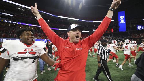 Milton head coach Ben Reaves celebrates as time expires as they defeat Walton in the Class 7A GHSA State Championship game at Mercedes-Benz Stadium, Wednesday, December. 13, 2023, in Atlanta. Milton won 31-21. (Jason Getz / Jason.Getz@ajc.com)