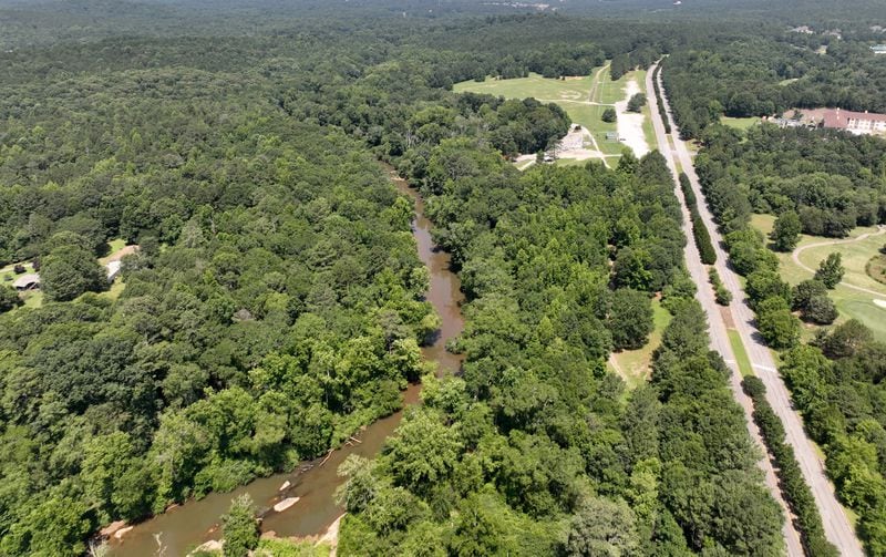 This aerial photo shows the proposed site of a pro women's soccer complex adjacent to the Georgia International Horse Park, Thursday, June 29, 2023, in Conyers. The Yellow River is shown on left. Centennial Olympic Parkway is shown on the right. (Hyosub Shin / Hyosub.Shin@ajc.com)