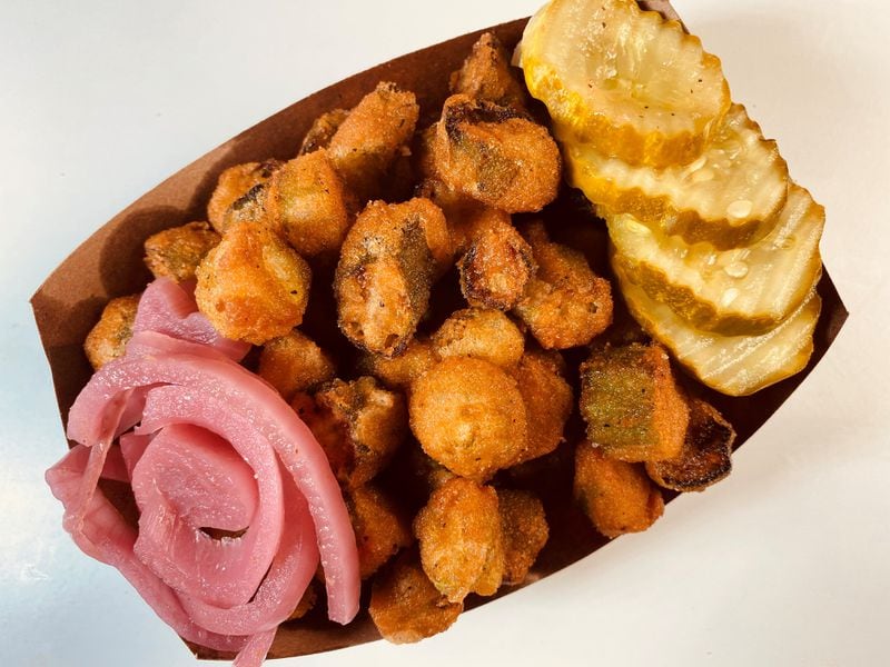 Fried okra with pickled onions and pickles is available from Ford’s BBQ in Tucker. Bob Townsend for The Atlanta Journal-Constitution
