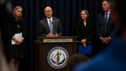 Ramsey County Attorney John Choi, at podium, discusses his office's review of former Ramsey County Medical Examiner Michael McGee's work during a news conference in St. Paul, Minn. on Wednesday, Sept. 11, 2024.(John Autey/Pioneer Press via AP)