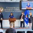 Assistant Attorney General Kristen Clarke, center, of the Justice Department's Civil Rights Division speaks about a new Department of Justice report about the state of Georgia's prisons at a press conference at the Richard B. Russell Federal Building in Atlanta, Tuesday, Oct. 1, 2024. On her left is U.S. Attorney Ryan K. Buchanan for the Northern District of Georgia and on her right are U.S. Attorney Peter D. Leary for the Middle District of Georgia and U.S. Attorney Jill E. Steinberg for the Southern District of Georgia. (Arvin Temkar/Atlanta Journal-Constitution via AP)