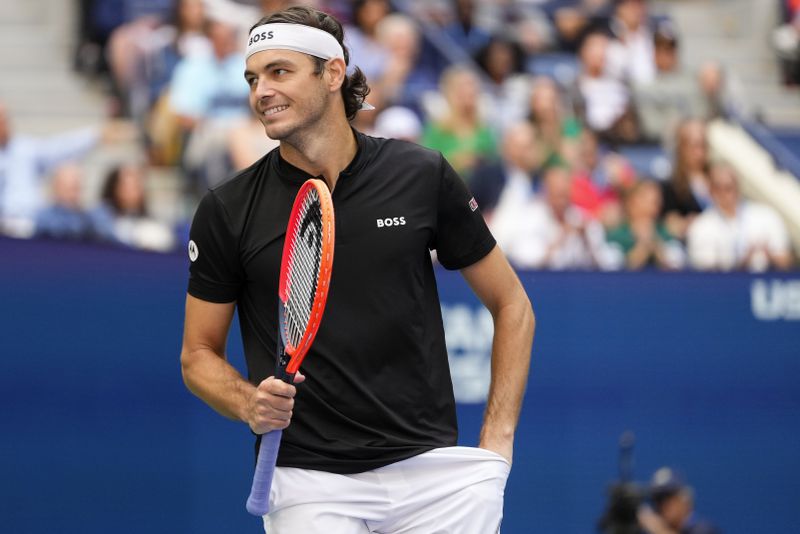 Taylor Fritz, of the United States, reacts in the second set against Jannik Sinner, of Italy, during the men's singles final of the U.S. Open tennis championships, Sunday, Sept. 8, 2024, in New York. (AP Photo/Kirsty Wigglesworth)