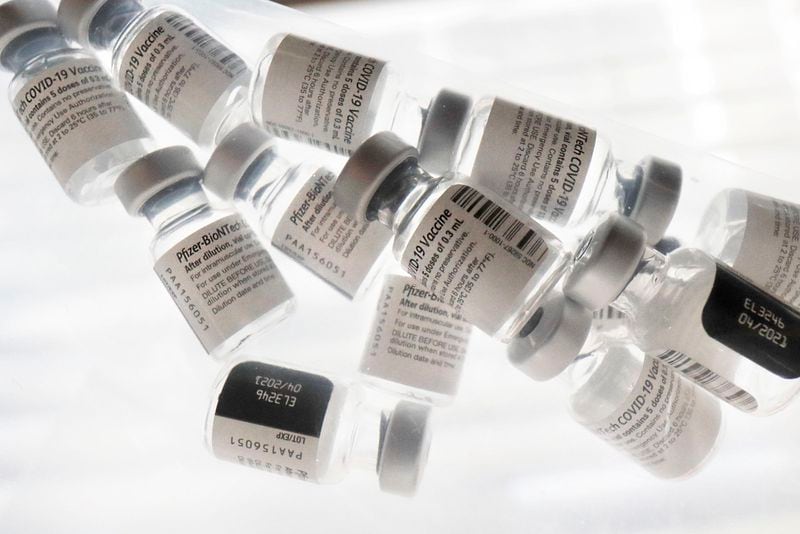 A bag of empty vials of the Pfizer-BioNTech COVID-19 vaccine in 2021. (Elizabeth Robertson/TNS)