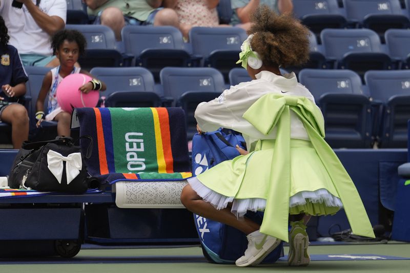 Naomi Osaka, of Japan, prepares to play against Jelena Ostapenko, of Latvia, during the first round of the U.S. Open tennis championships, Tuesday, Aug. 27, 2024, in New York. (AP Photo/Seth Wenig)