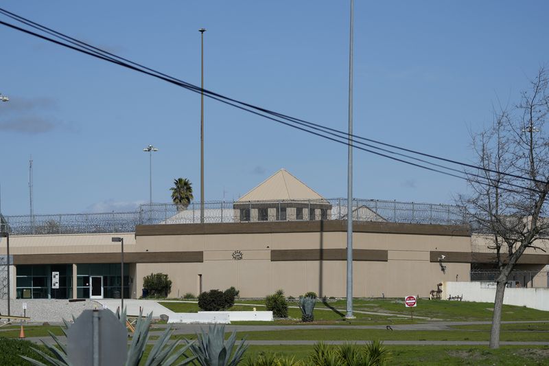 FILE - The Federal Correctional Institution is shown in Dublin, Calif., Monday, March 11, 2024. The federal Bureau of Prisons will go to trial next year over claims it allowed an environment where guards at a now-shuttered California prison sexually abused incarcerated women, a judge ordered Wednesday, May 22, 2024. (AP Photo/Jeff Chiu, File)