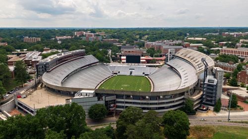 June 11, 2021 Athens - Aerial photo shows Sanford Stadium at the University of Georgia in Athens on Friday, June 11, 2021. With a $25 million expansion completed in 2003 and another $8 million in 2004, Sanford Stadium added a second upper deck on the north side and 27 new north side SkySuites bringing the new stadium capacity to 92,746Ñthe fifth largest on-campus stadium in the country. UGAÕs athletic department simply is committed to too many other facility projects that have precedence at the moment. Most notable is the $80 million football operations building that has been added to the Butts-Mehre complex. (Hyosub Shin / Hyosub.Shin@ajc.com)