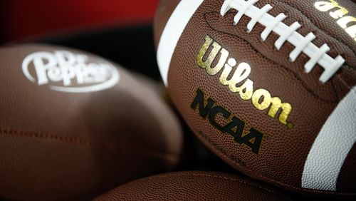 The Wilson and NCAA Logo is shown on a football as the Louisville Cardinals take on the Florida State Seminoles during the ACC Championship at Bank of America Stadium on Dec. 2, 2023, in Charlotte, North Carolina. (Isaiah Vazquez/Getty Images/TNS)