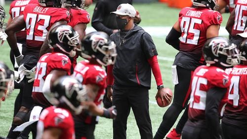 Atlanta Falcons head coach Raheem Morris (center) prepares his team to play the Detroit Lions in an NFL football game on Sunday, Oct 25, 2020 in Atlanta.   “Curtis Compton / Curtis.Compton@ajc.com”