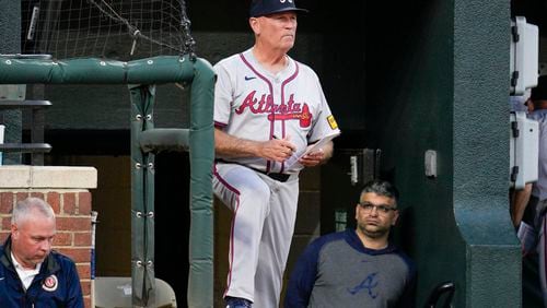 Atlanta Braves manager Brian Snitker looks on from the dugout during the sixth inning of a baseball game against the Baltimore Orioles, Tuesday, June 11, 2024, in Baltimore. (AP Photo/Jess Rapfogel)