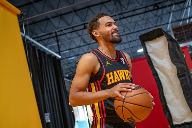 Hawks star Trae Young poses for photos during media day on Monday, Sept 30, 2024.  Media outlets gathered to take photos, conduct interviews and gather video footage.   (Jenni Girtman for The Atlanta Journal-Constitution)