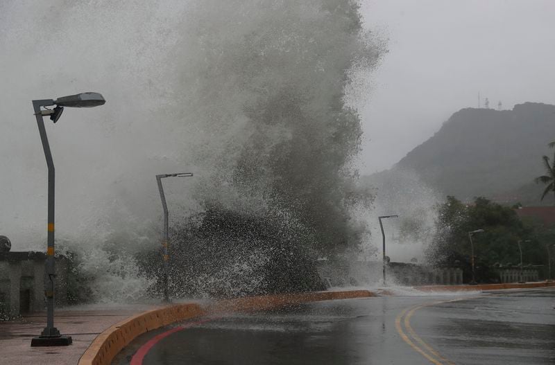 Waves crash on the coastline in Kaohsiung, southern Taiwan, Wednesday, Oct. 2, 2024, as Typhoon Krathon approaches to Taiwan. (AP Photo/Chiang Ying-ying)