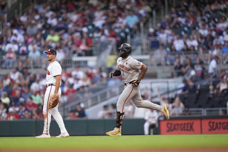San Francisco Giants' Jorge Soler (2) runs the bases after he hits a solo home run in the fifth inning of a baseball game against the Atlanta Braves, Tuesday, July 2, 2024, in Atlanta. (AP Photo/Brynn Anderson)