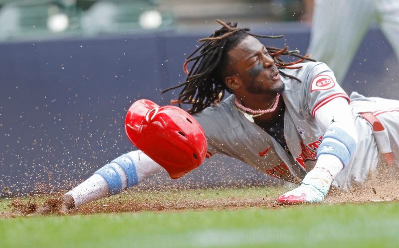 Cincinnati Reds' Elly De La Cruz scores against the Milwaukee Brewers during the third inning of a baseball game Sunday, June 16, 2024, in Milwaukee. (AP Photo/Jeffrey Phelps)