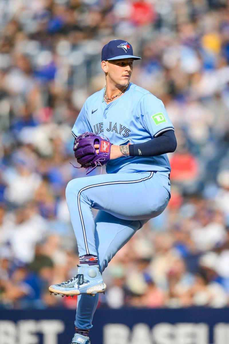 Toronto Blue Jays pitcher Bowden Francis throws during the ninth inning of a baseball game against the Los Angeles Angels in Toronto, Saturday, Aug. 24, 2024. (Christopher Katsarov/The Canadian Press via AP)