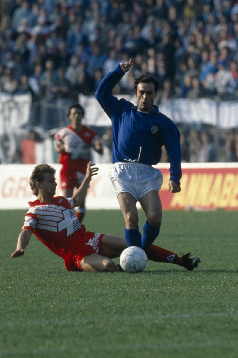 Italy Salvatore "Totò" Schillaci, right, controls the ball during a World Cup soccer match between Italy and Austria, in Rome, on June 9, 1990. (LaPresse via AP)