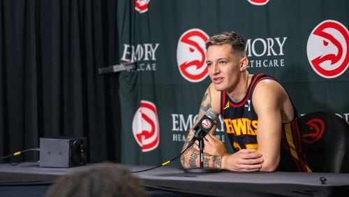 Hawks player Vit Krejci, #27, takes questions during media day. Hawks media day takes place on Monday, Sept 30, 2024 where media outlets including the Associated Press, Getty, NBA and many others gather to take photos, conduct interviews and gather footage.   (Jenni Girtman for The Atlanta Journal-Constitution)