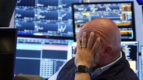 Trader Vincent Napolitano works on the floor of the New York Stock Exchange, Monday, Aug. 5, 2024. (AP Photo/Richard Drew)