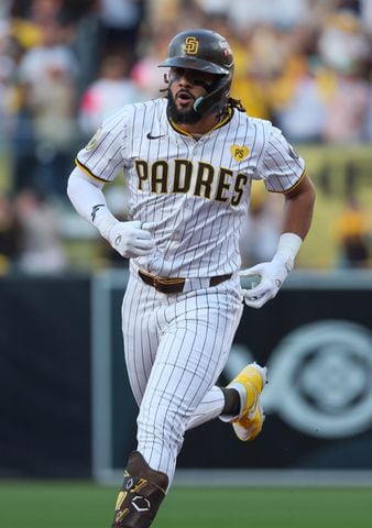 San Diego Padres’ Fernando Tatis Jr. rounds the bases after a 2-RBI home run against the Atlanta Braves during the first inning of National League Division Series Wild Card Game One at Petco Park in San Diego on Tuesday, Oct. 1, 2024.   (Jason Getz / Jason.Getz@ajc.com)