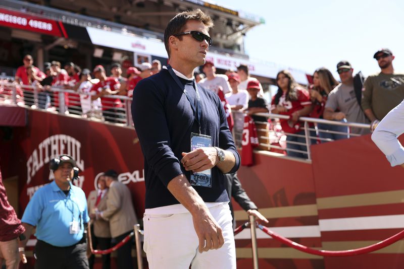 Tom Brady walks onto the file before San Francisco 49ers play New Orleans Saints beforeNFL preseason game at Levi's Stadium in Santa Clara, Calif., on Sunday, August 18, 2024./San Francisco Chronicle via AP)